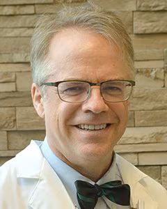John M. Cooper III, DO